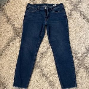 Mid rise Rockstar Super Skinny jeans. Size 8. Not tight fitting! Frayed bottoms.
